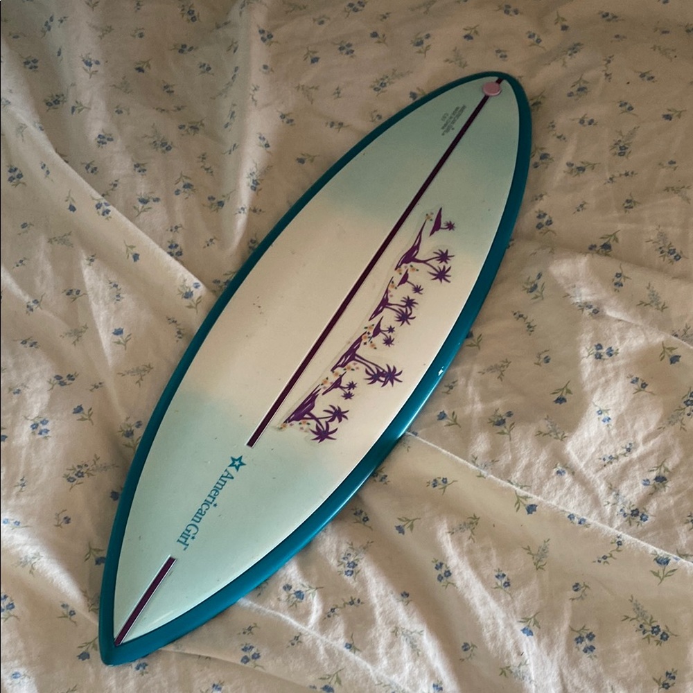 American Girl Teal and White Surfboard with Purple Design